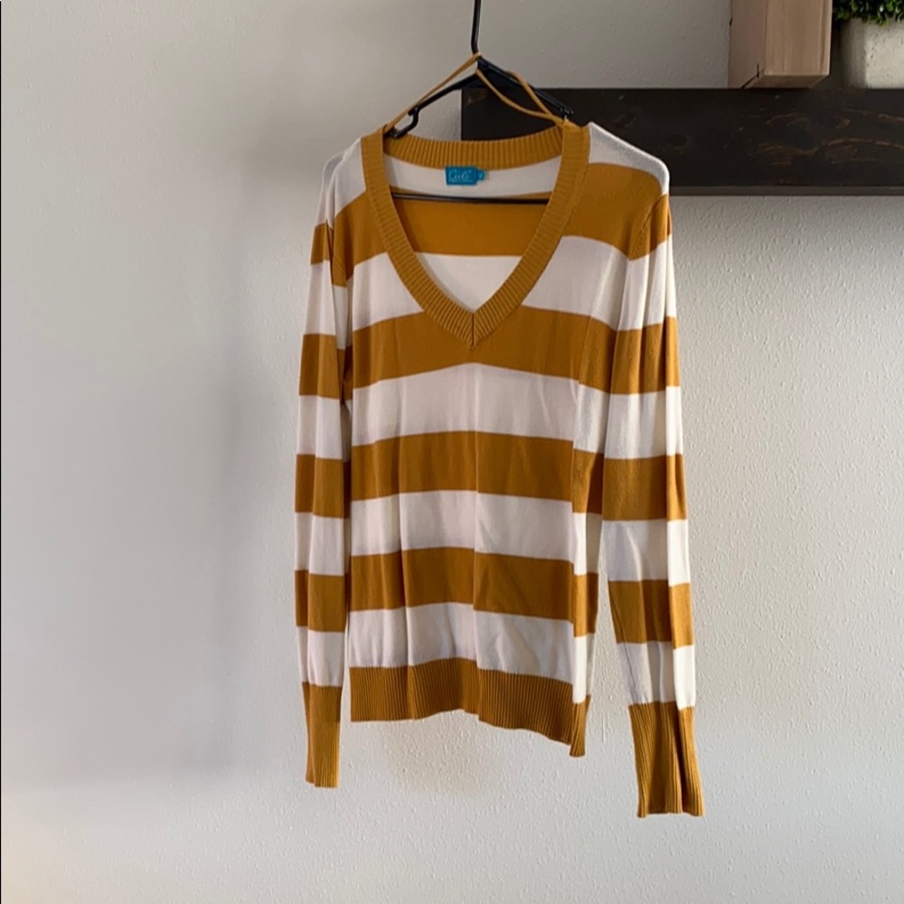 Yellow and white striped sweater